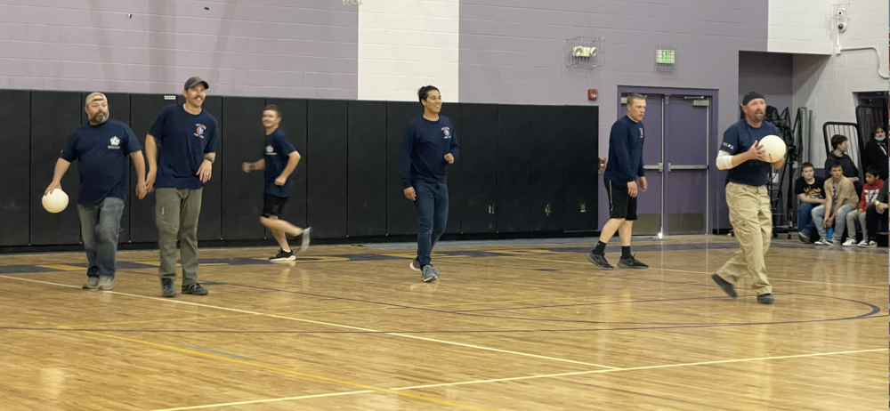 Emergency personel playing dodgeball